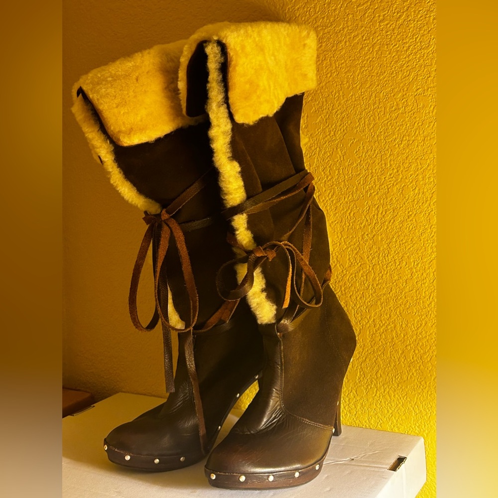 Michael Kors boots size 6.5. Never worn